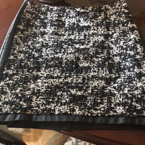 Ann Taylor tweed skirt with faux leather details.